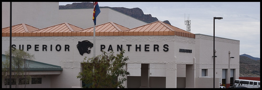 Superior Panthers outside of building